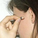 Miniature wireless in-ear headset